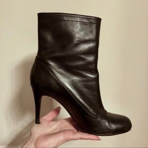 Coach black leather zipper high heel booties